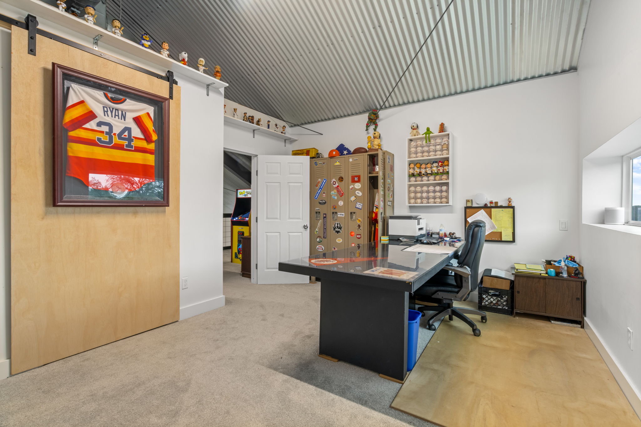 180 Henly Loop Dripping Springs, TX 78620 - Photo 25 of 38 a view of a workspace with furniture and a window
