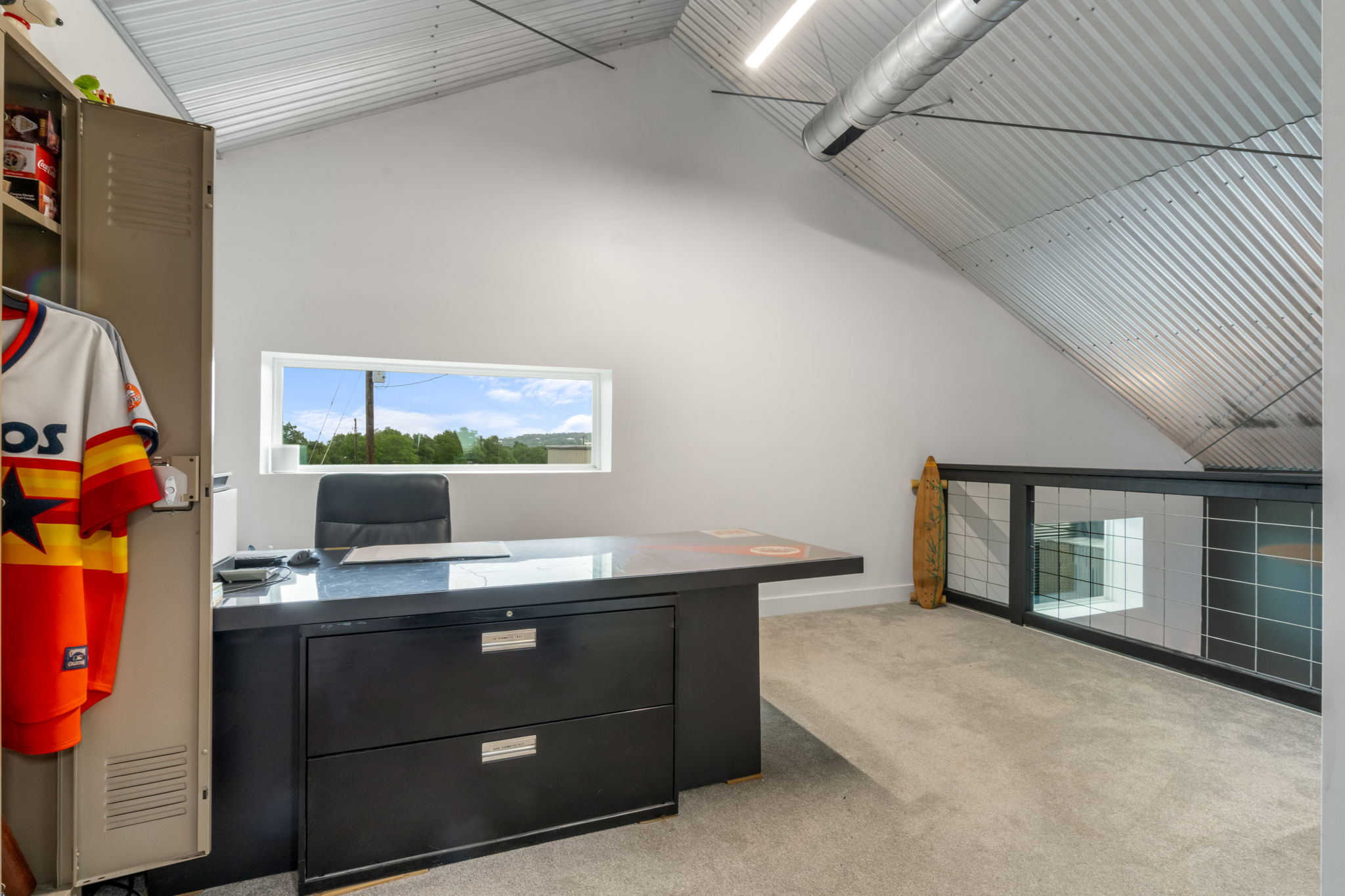 180 Henly Loop Dripping Springs, TX 78620 - Photo 26 of 38 a room with furniture and window