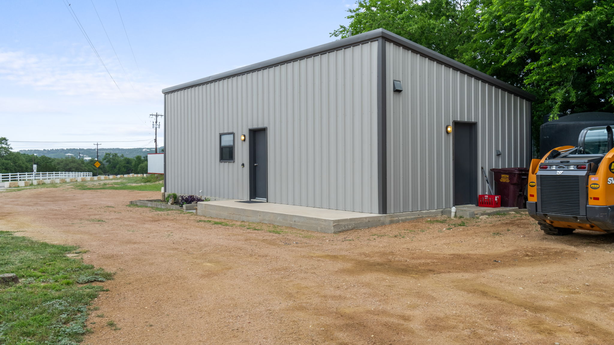 180 Henly Loop Dripping Springs, TX 78620 - Photo 27 of 38 a view of backyard of house