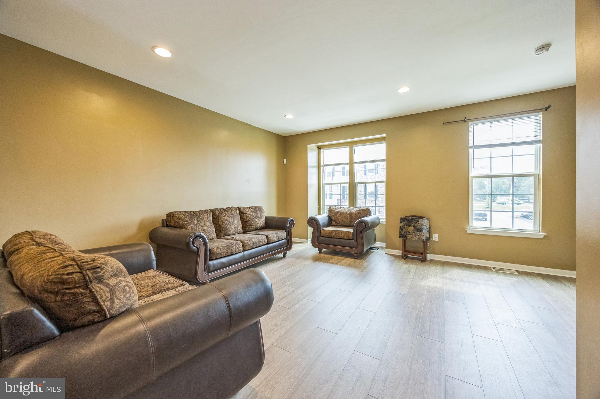 1072 Prime Place Sewell, NJ 08080 - Photo 20 of 36 a living room with furniture and a flat screen tv