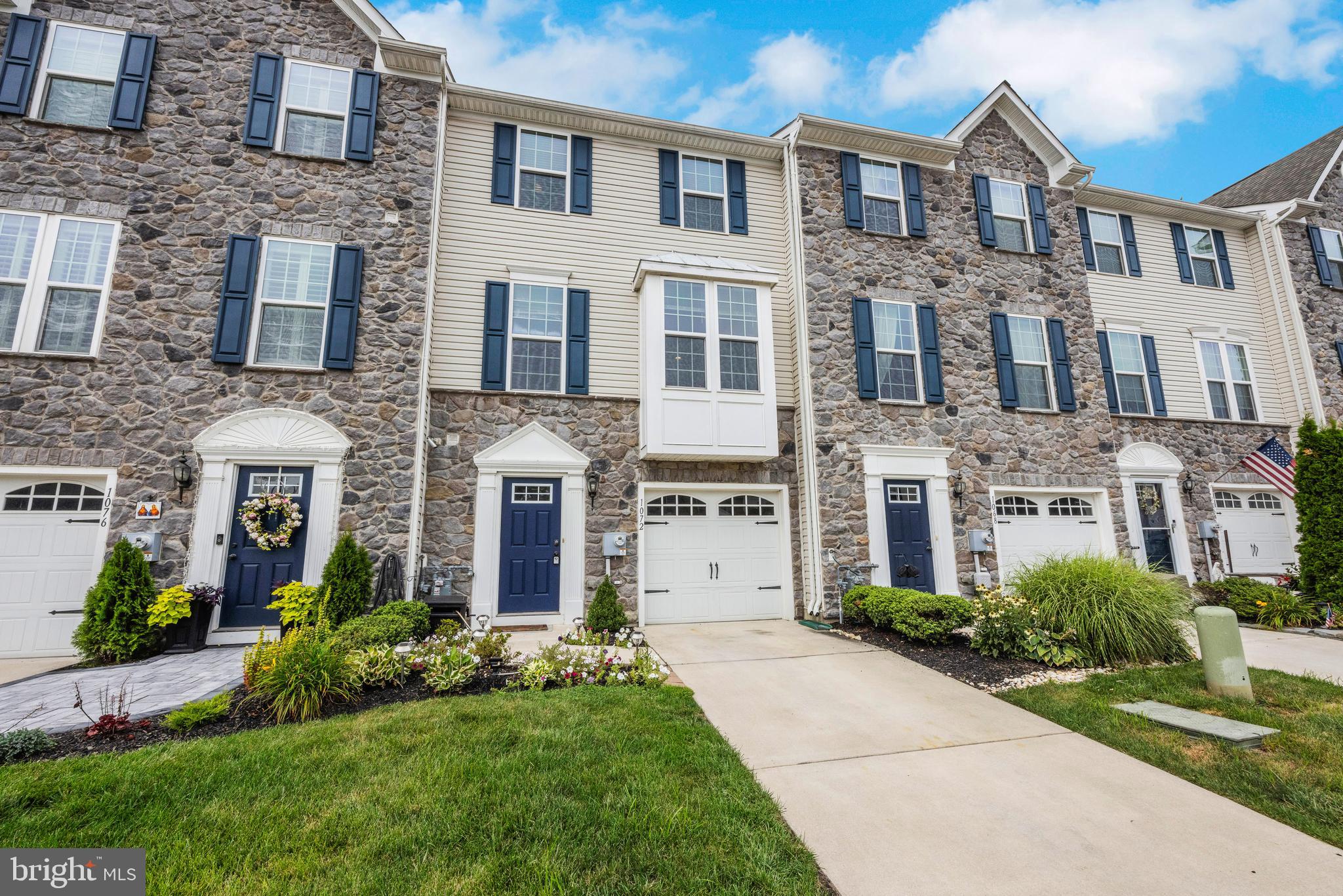 1072 Prime Place Sewell, NJ 08080 - Photo 2 of 36 a front view of a house with a yard