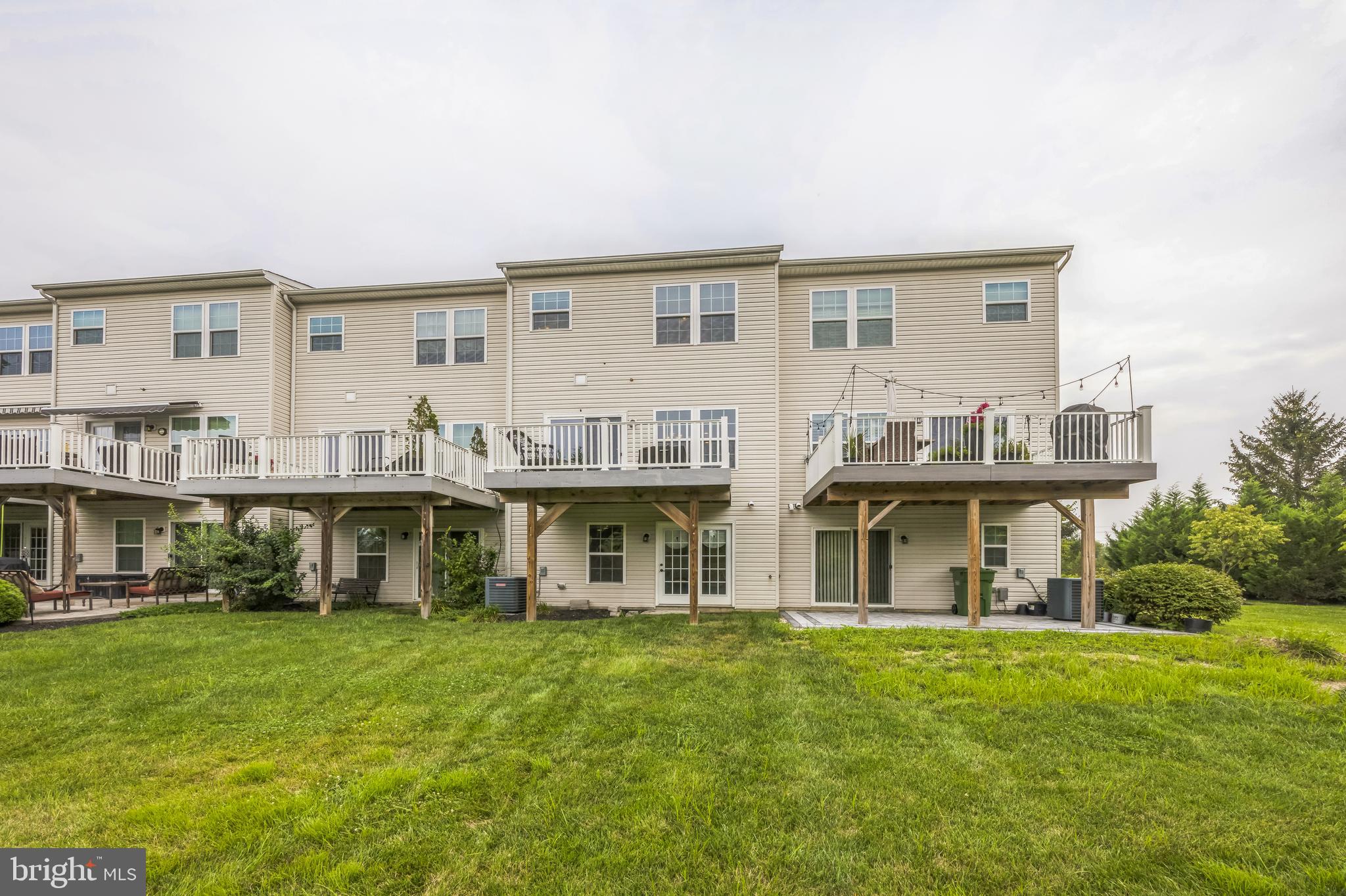 1072 Prime Place Sewell, NJ 08080 - Photo 36 of 36 a front view of multiple houses with yard