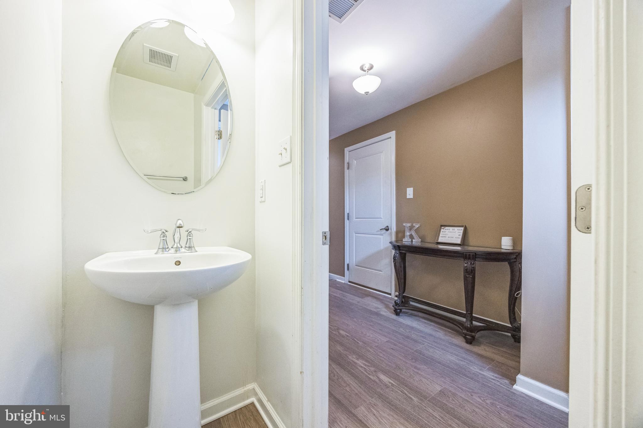 1072 Prime Place Sewell, NJ 08080 - Photo 5 of 36 a bathroom with a sink and a mirror