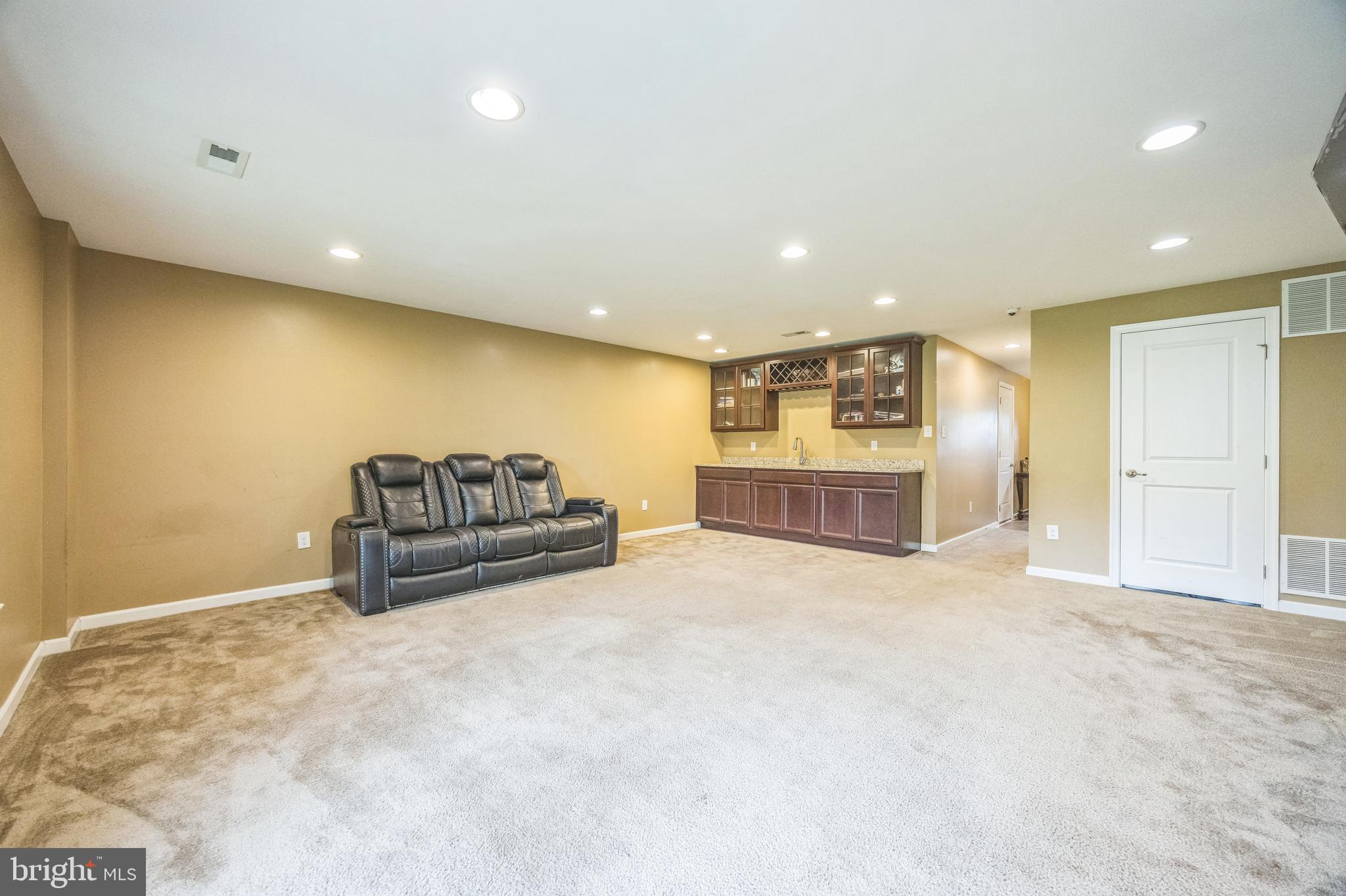 1072 Prime Place Sewell, NJ 08080 - Photo 9 of 36 a living room with furniture and a walk in closet