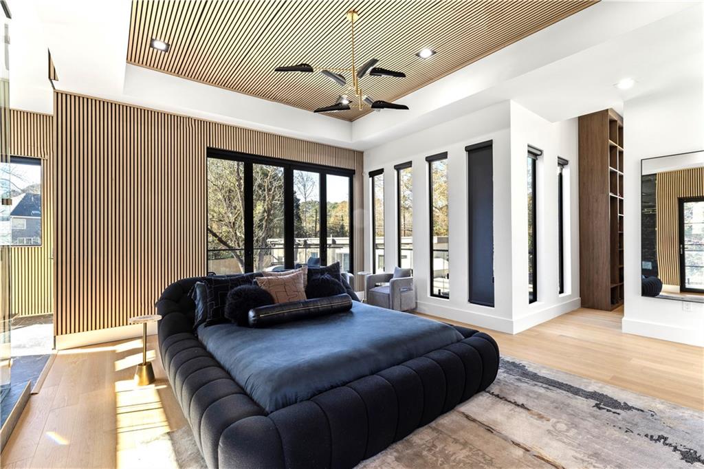 3600 Lower Roswell Road Marietta, GA 30068 - Photo 43 of 83 a bedroom with a large bed and a large window