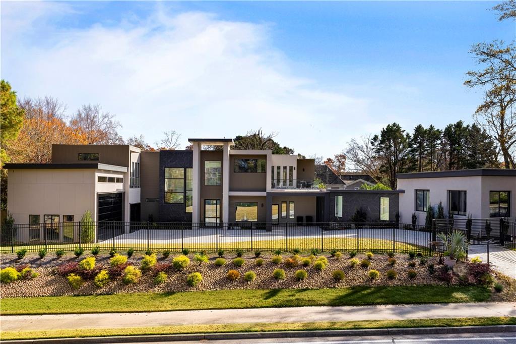 3600 Lower Roswell Road Marietta, GA 30068 - Photo 8 of 83 front view of a house with a yard