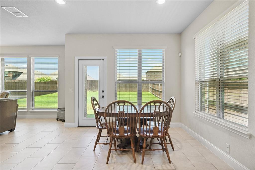 4102 Sublett Way Kaufman, TX 75142 - Photo 17 of 40 Dining area with light tile patterned floors and recessed lighting