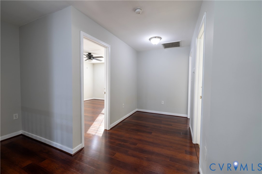 4801 Shellbark Court Glen Allen, VA 23059 - Photo 27 of 43 an empty room with wooden floor and windows