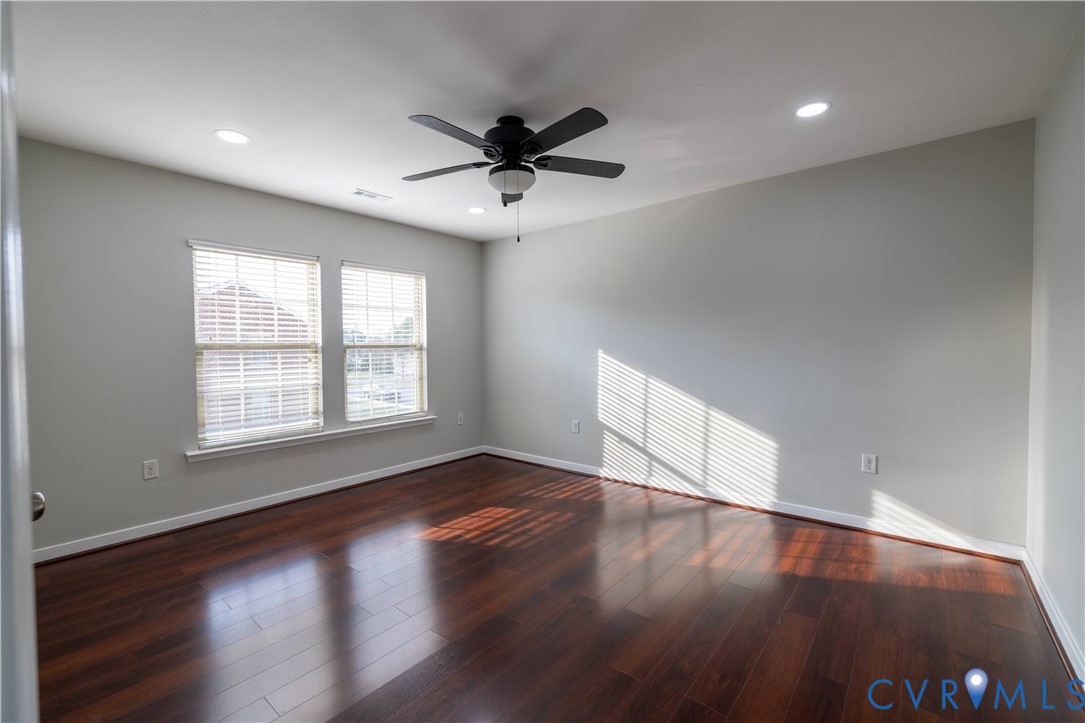 4801 Shellbark Court Glen Allen, VA 23059 - Photo 35 of 43 a view of an empty room with wooden floor and a window
