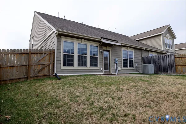 a house with yard in front of it