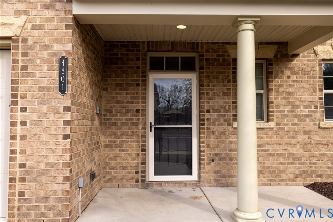 4801 Shellbark Court Glen Allen, VA 23059 - Photo 5 of 43 a front view of a building with a shower and a door