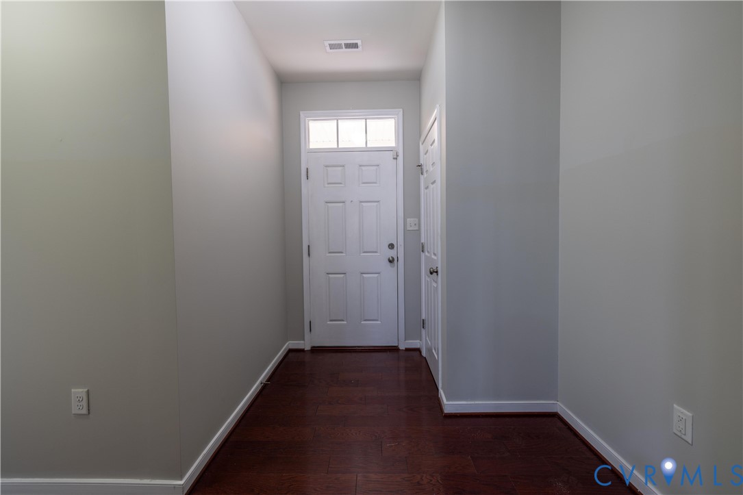 4801 Shellbark Court Glen Allen, VA 23059 - Photo 10 of 43 wooden floor and window in an empty room