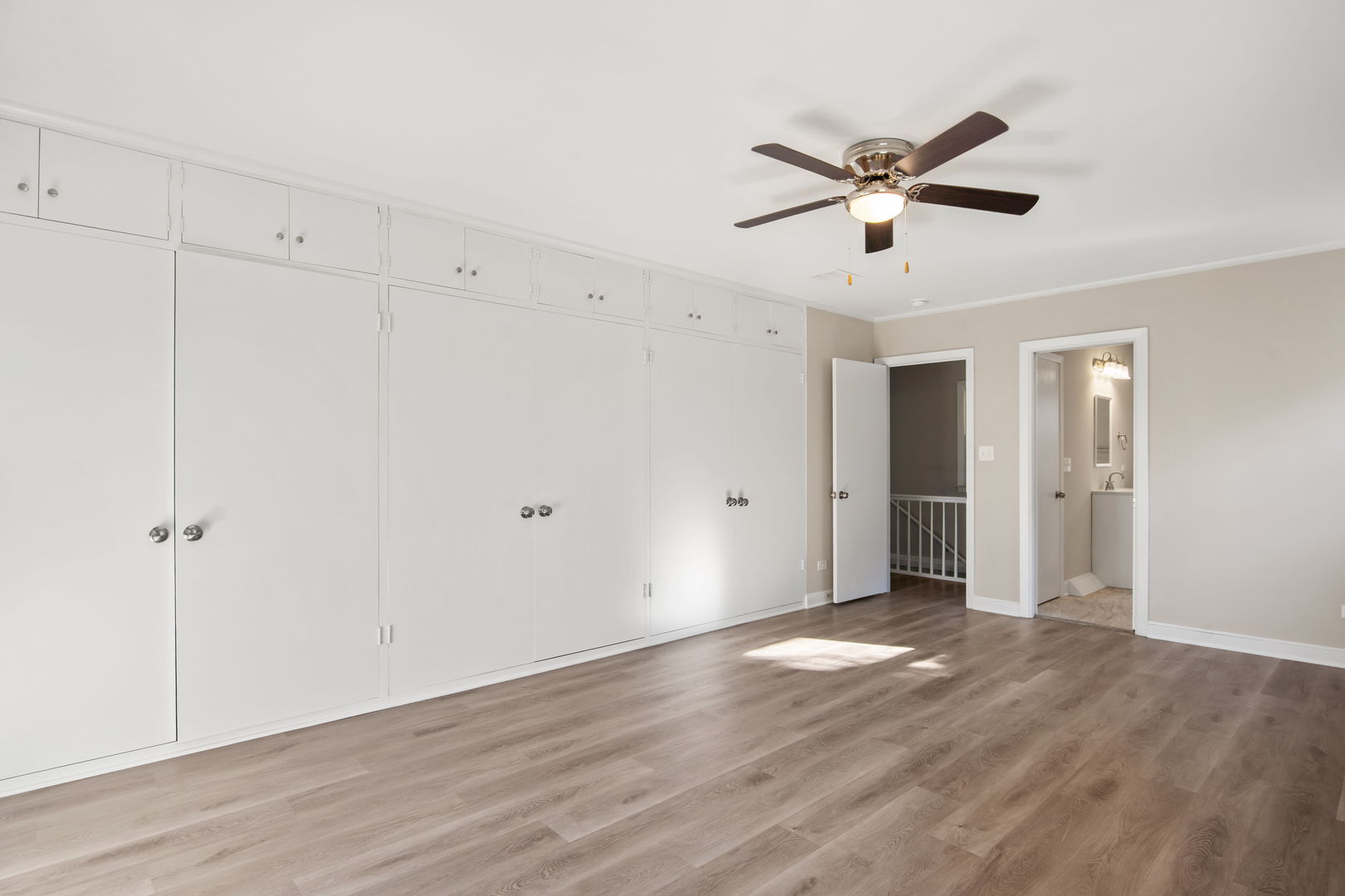 914 Brook Street Elgin, IL 60120 - Photo 19 of 21 a view of an empty room with wooden floor