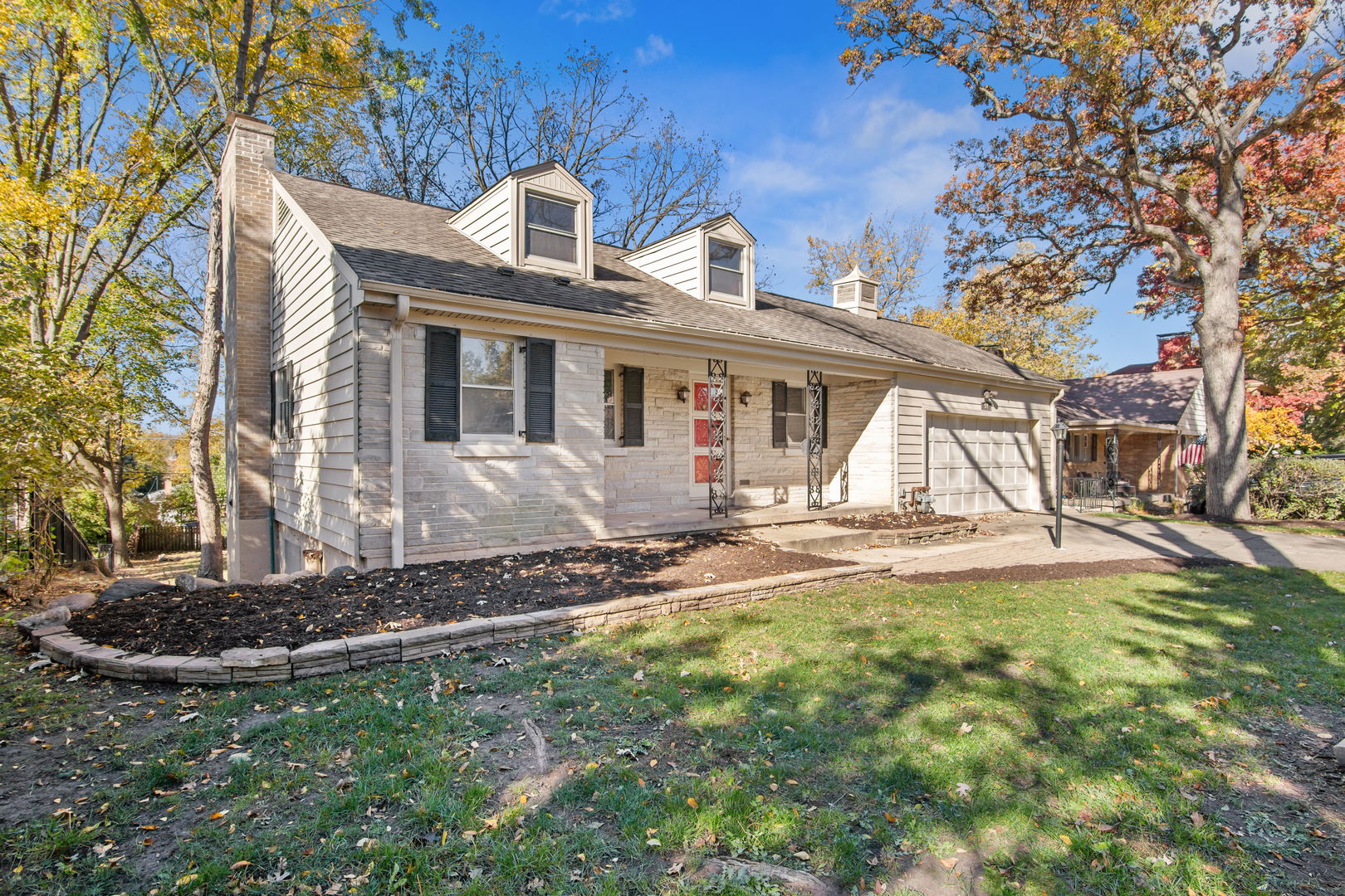 914 Brook Street Elgin, IL 60120 - Photo 3 of 21 a view of a house with backyard and sitting area