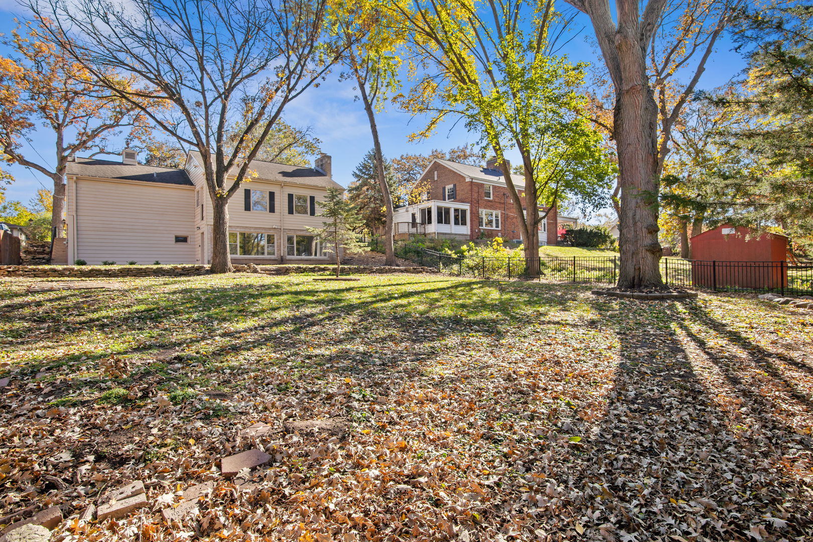 914 Brook Street Elgin, IL 60120 - Photo 5 of 21 a view of a house with a yard covered with snow and trees