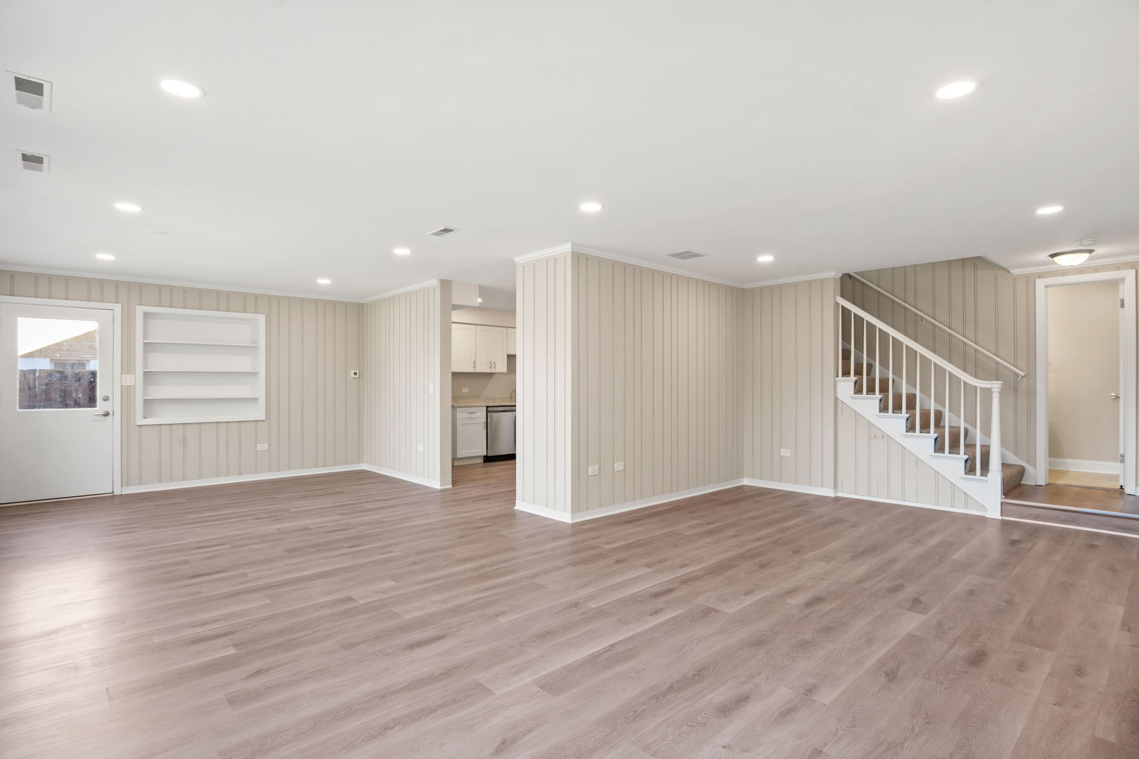 914 Brook Street Elgin, IL 60120 - Photo 9 of 21 a view of an empty room with wooden floor
