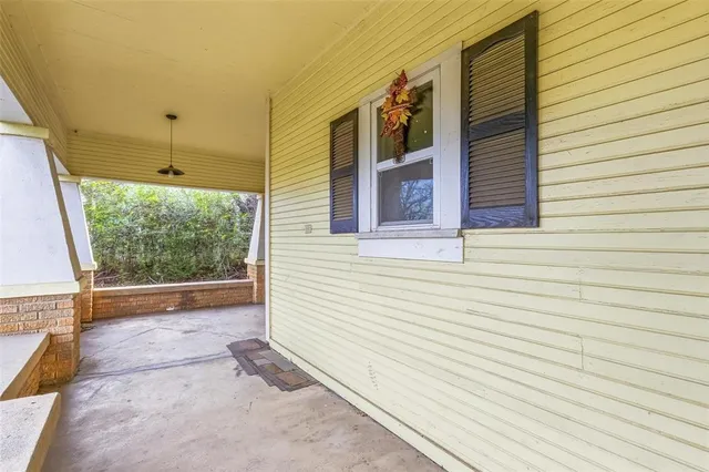 a porch with seating space