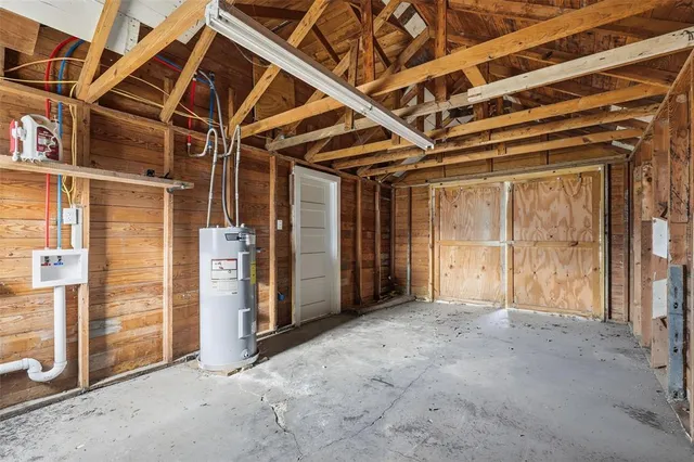 a view of a room with wooden walls