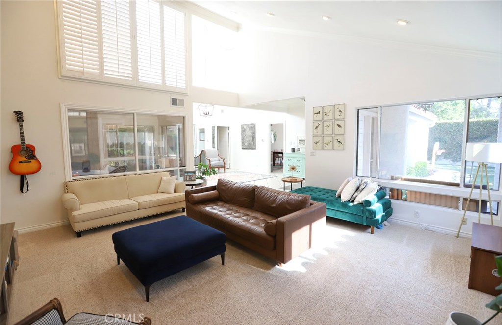 48 Cedar Tree Lane Irvine, CA 92612 - Photo 14 of 52 a living room with furniture and a large window