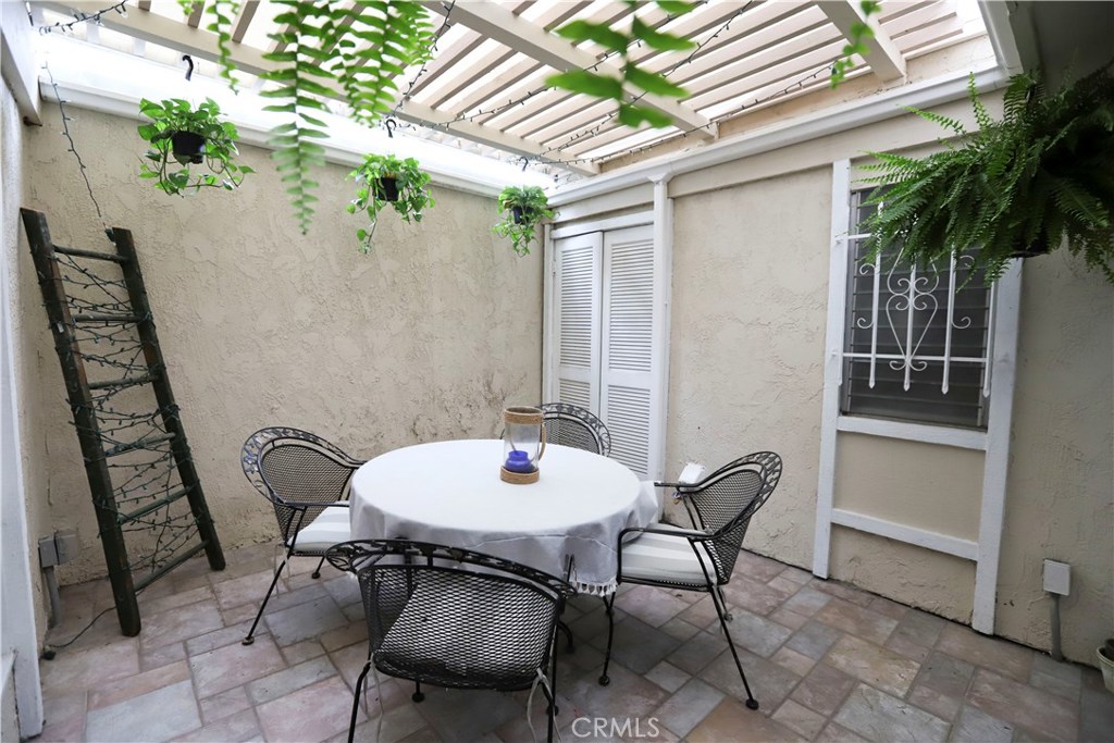 48 Cedar Tree Lane Irvine, CA 92612 - Photo 18 of 52 a view of a outdoor seating area
