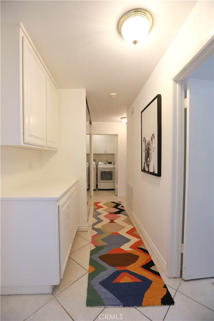 48 Cedar Tree Lane Irvine, CA 92612 - Photo 19 of 52 a bedroom with a bed and a painting on the wall