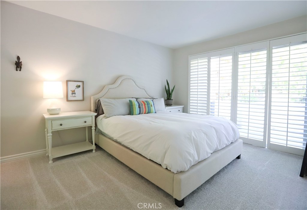 48 Cedar Tree Lane Irvine, CA 92612 - Photo 20 of 52 a bed room with a bed and a window