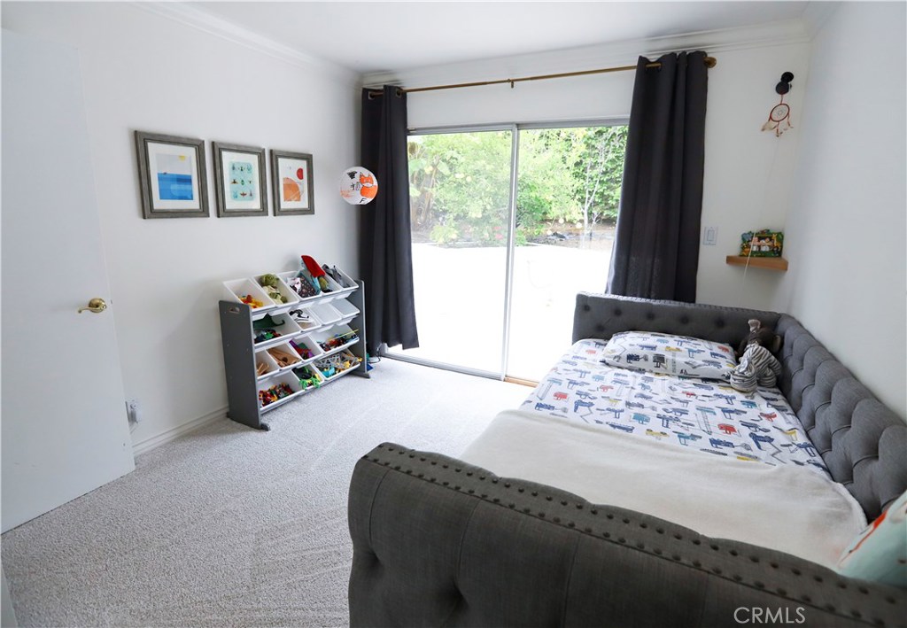 48 Cedar Tree Lane Irvine, CA 92612 - Photo 21 of 52 a bedroom with a bed and a window