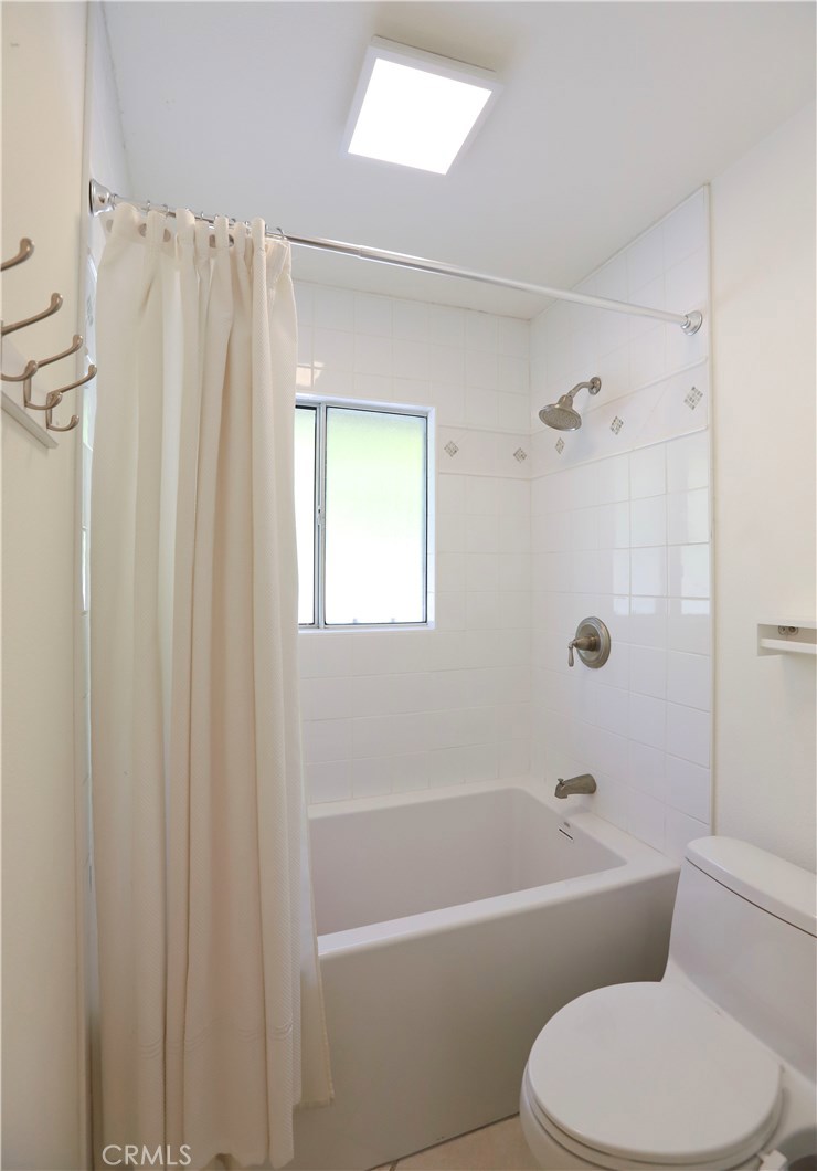 48 Cedar Tree Lane Irvine, CA 92612 - Photo 23 of 52 a bathroom with a toilet a sink and a bathtub