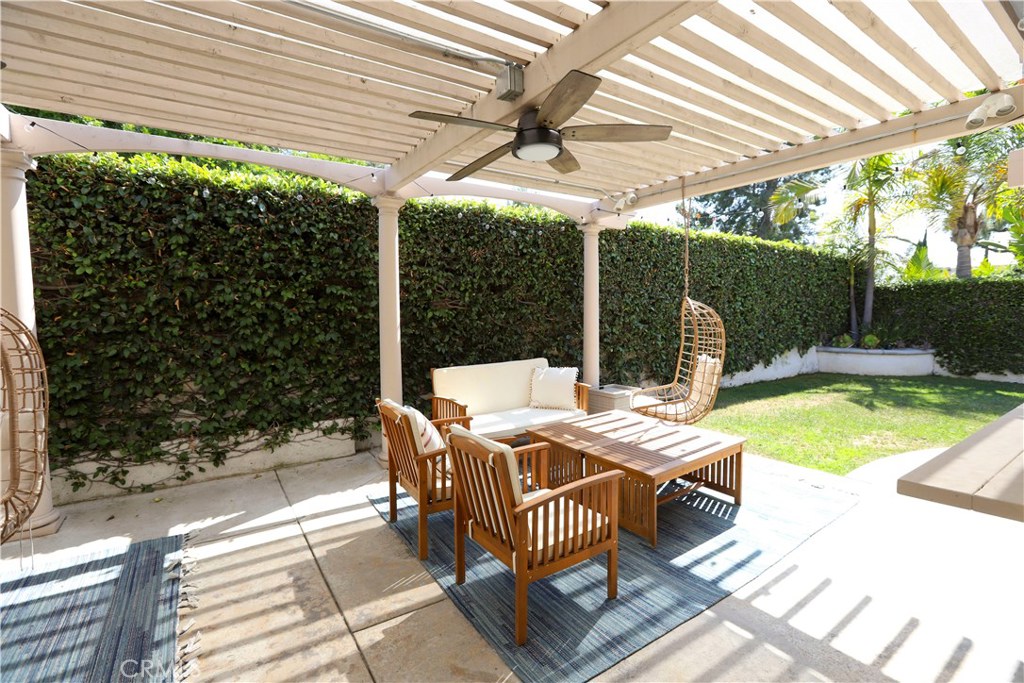 48 Cedar Tree Lane Irvine, CA 92612 - Photo 29 of 52 a view of a patio with a table chairs and a patio