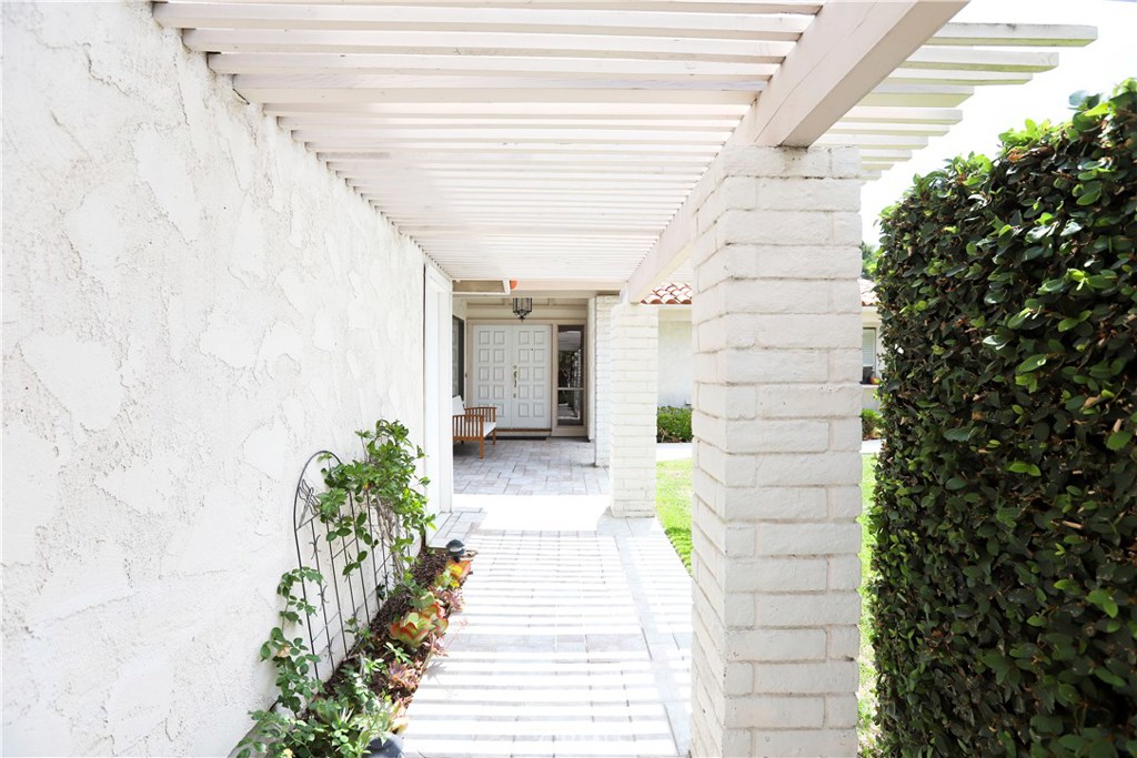 48 Cedar Tree Lane Irvine, CA 92612 - Photo 34 of 52 a view of a pathway with flower plants