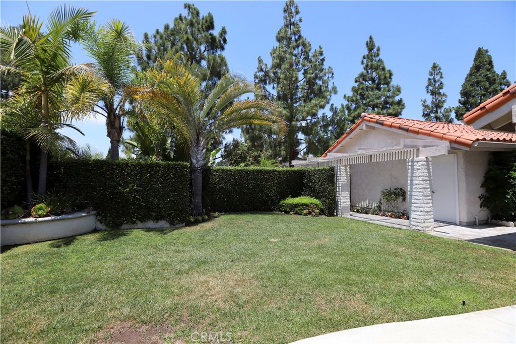 48 Cedar Tree Lane Irvine, CA 92612 - Photo 37 of 52 a view of a house with a yard and tree s