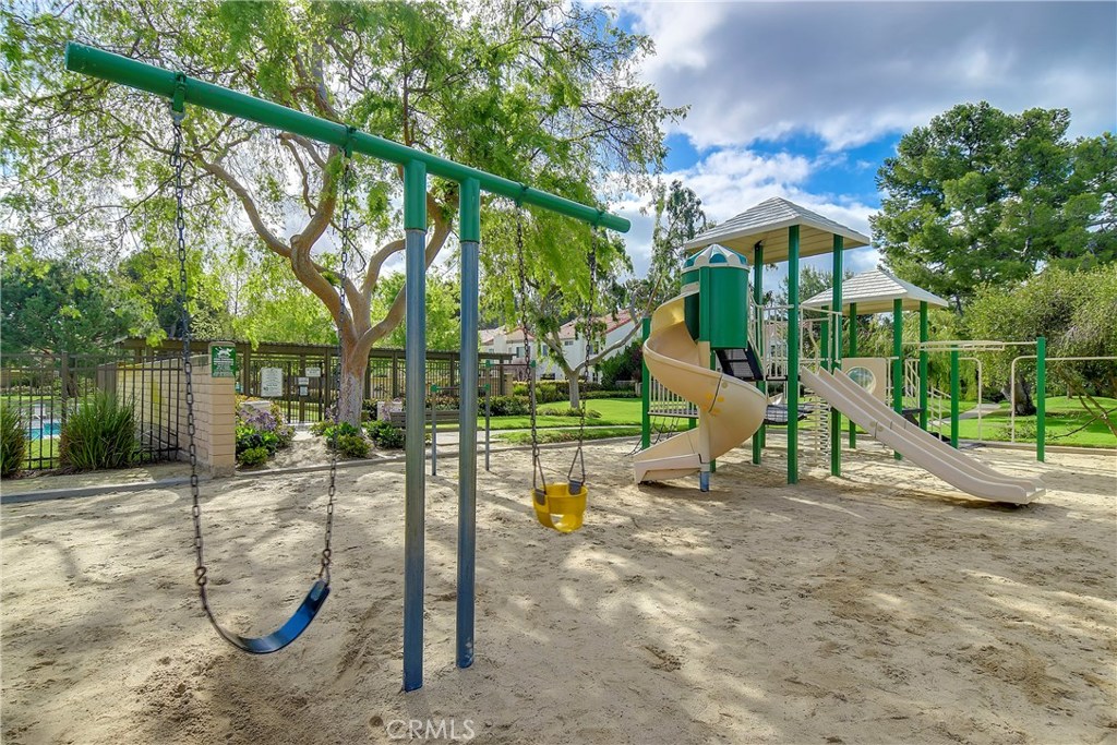 48 Cedar Tree Lane Irvine, CA 92612 - Photo 43 of 52 a view of a park with slide