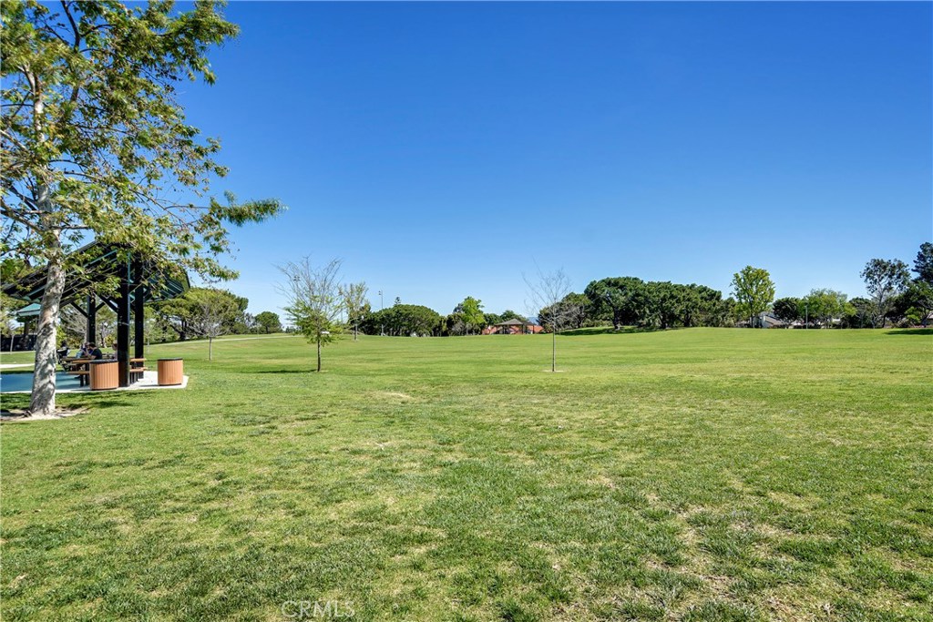 48 Cedar Tree Lane Irvine, CA 92612 - Photo 45 of 52 a view of building with outdoor space