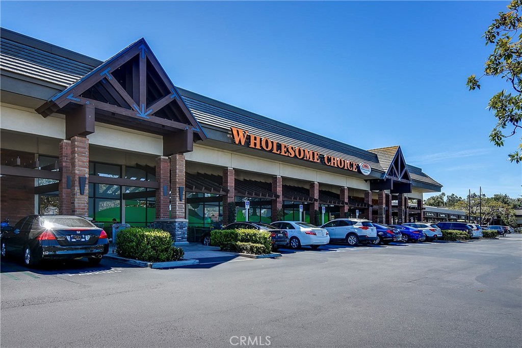 48 Cedar Tree Lane Irvine, CA 92612 - Photo 48 of 52 a car parked in front of a building