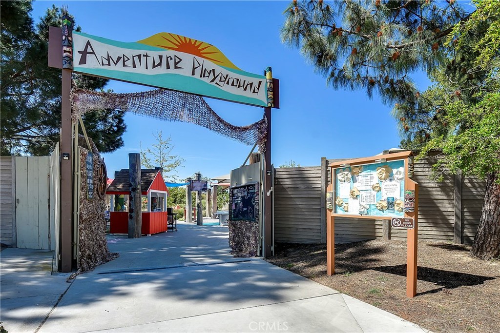 48 Cedar Tree Lane Irvine, CA 92612 - Photo 51 of 52 a view of a street with stores