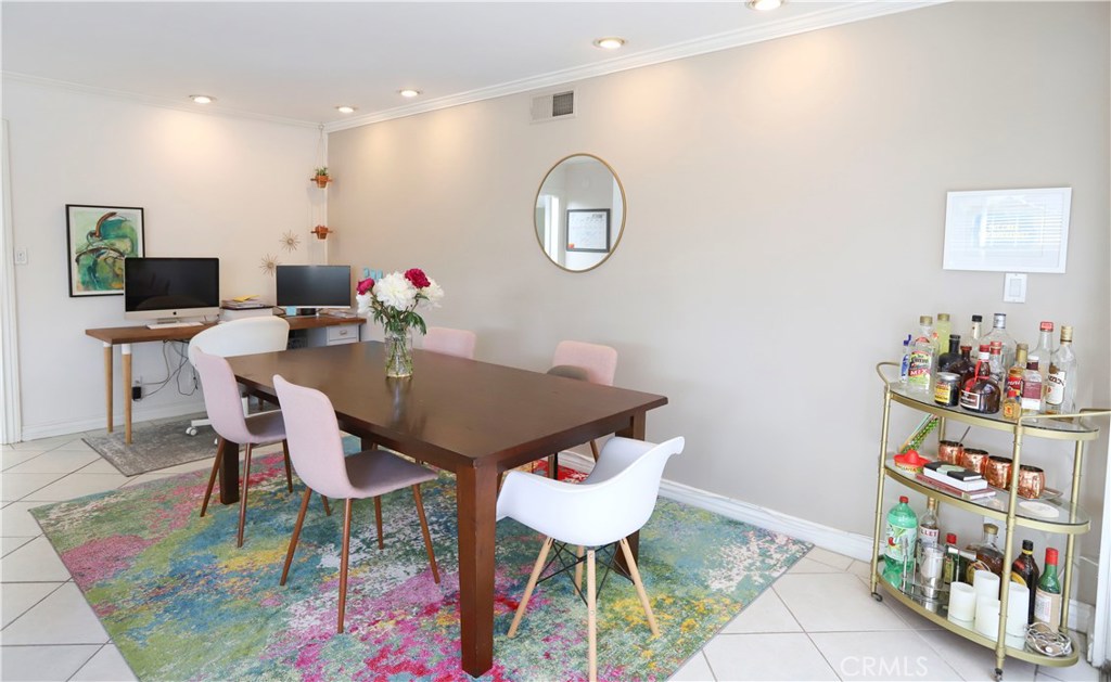 48 Cedar Tree Lane Irvine, CA 92612 - Photo 6 of 52 a view of a dining room with furniture and wooden floor