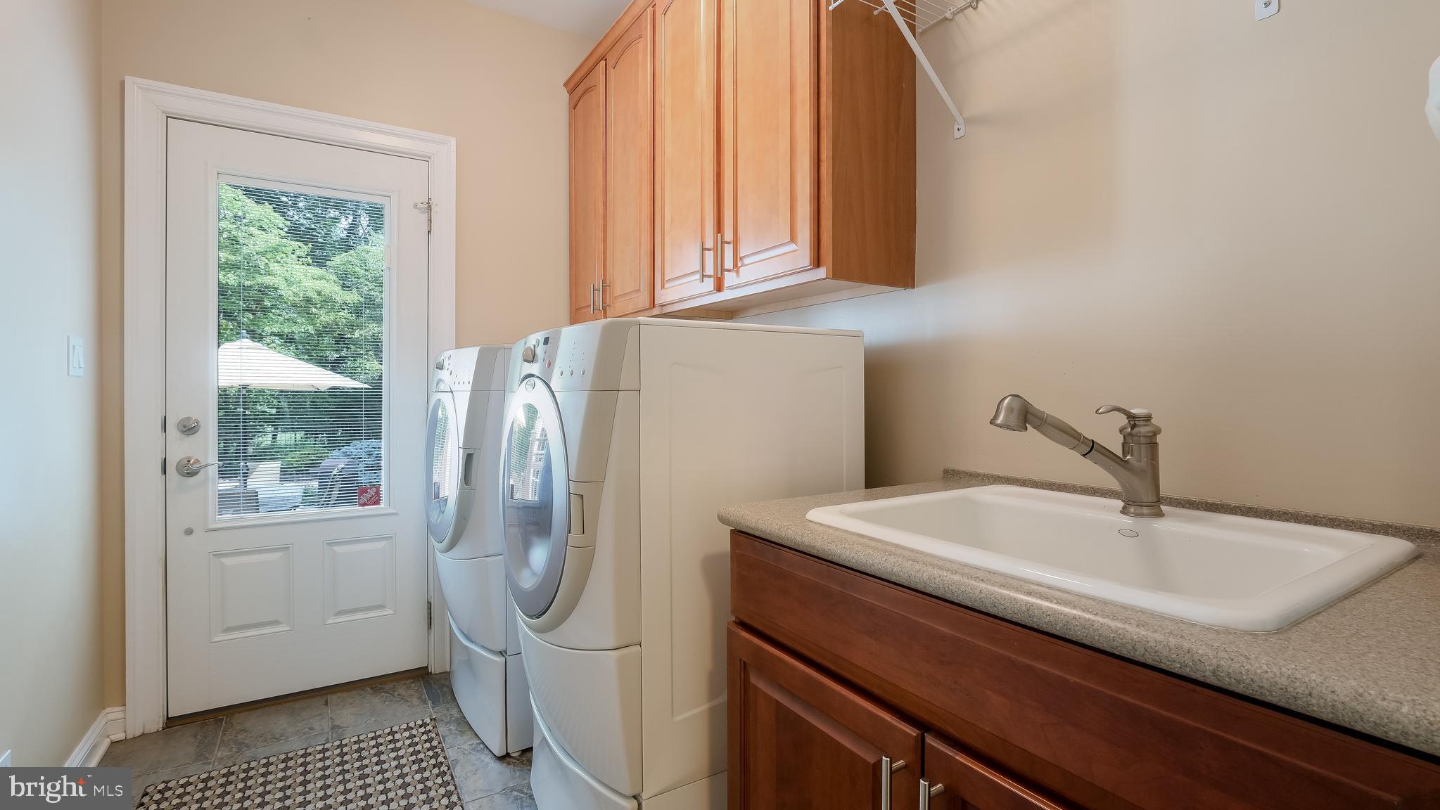 3269 Ash Mill Road Doylestown, PA 18902 - Photo 30 of 81 Main Floor Laundry. Door to Deck/pool area