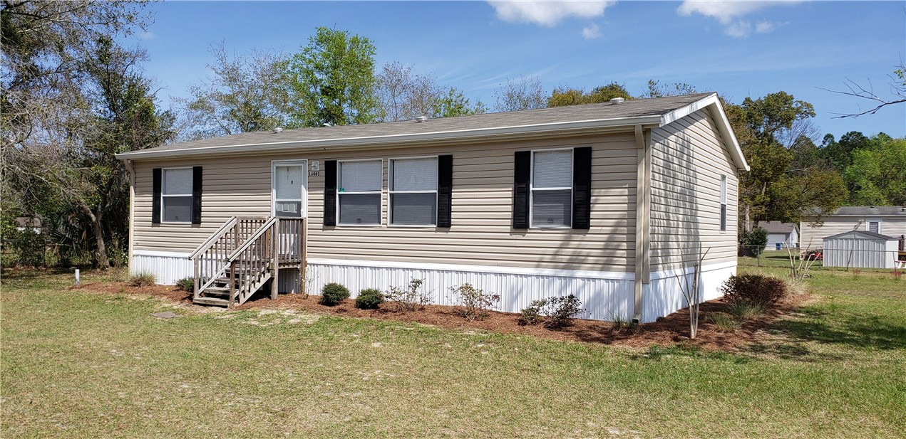 13465 Yellow Bluff Road Jacksonville, FL 32226 - Photo 1 of 30 a view of a house with a yard