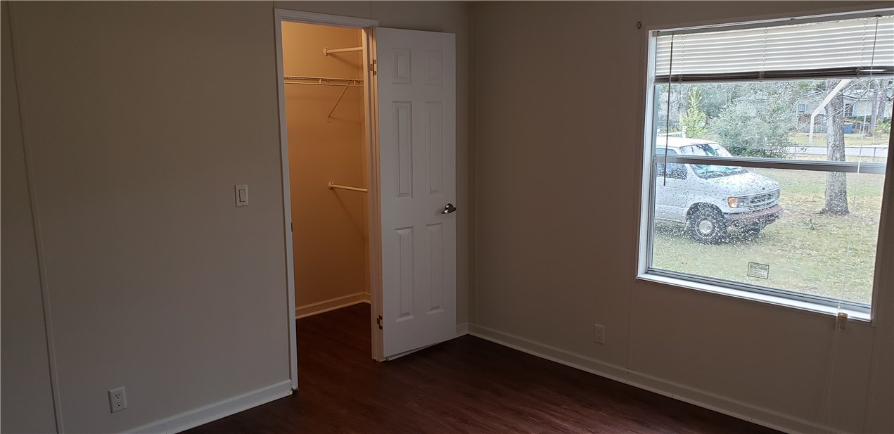 13465 Yellow Bluff Road Jacksonville, FL 32226 - Photo 15 of 30 a view of a small space with wooden floor and a window