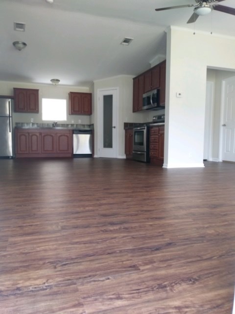 13465 Yellow Bluff Road Jacksonville, FL 32226 - Photo 6 of 30 a view of a kitchen with stainless steel appliances wooden floor and floors