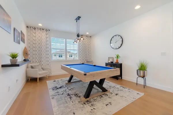 a living room with furniture and a table