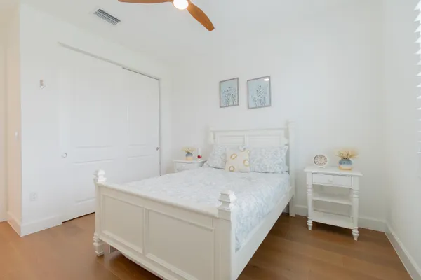 a room with a bed and a view of bathroom