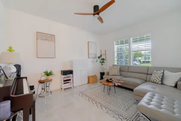 a living room with furniture and a window