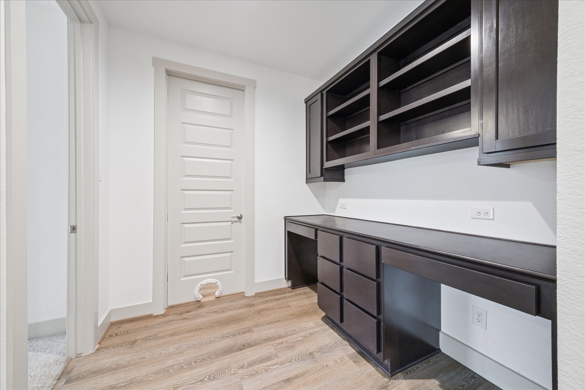 2550 Austin Trail Friendswood, TX 77546 - Photo 26 of 35 This built in desk area is a perfect space for those that work from home or a kid's homework area.