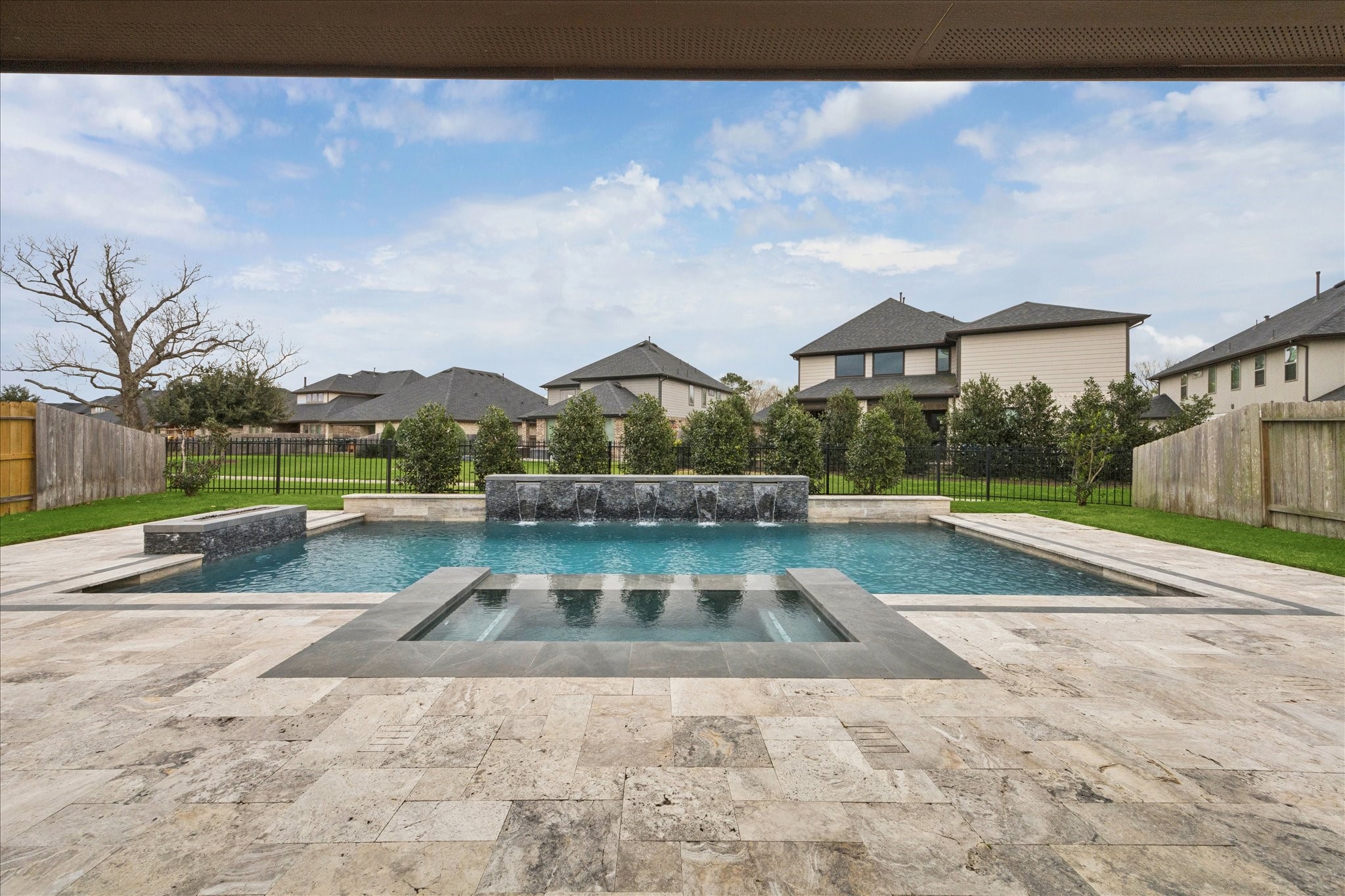 2550 Austin Trail Friendswood, TX 77546 - Photo 29 of 35 Custom McKinney pool, spa and gas fire pit with water features.