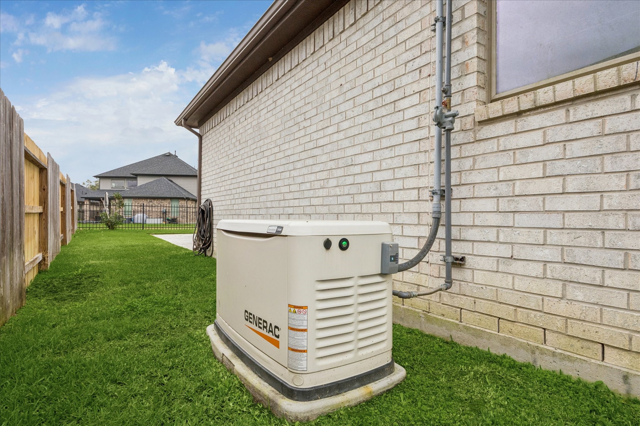 2550 Austin Trail Friendswood, TX 77546 - Photo 33 of 35 This whole home generator was installed in 2024 and is a great back up when the power goes out.