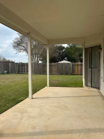 a view of a garden with an outdoor space