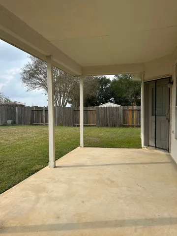 a view of a garden with an outdoor space