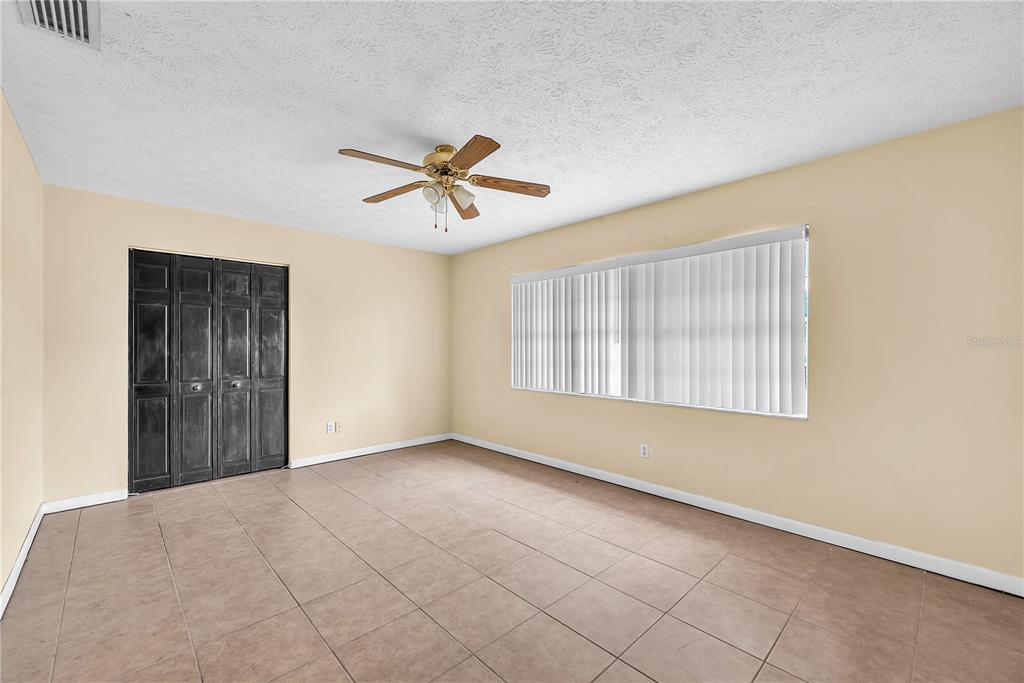 3420 Yale Circle Riverview, FL 33578 - Photo 13 of 30 a view of an empty room with a window