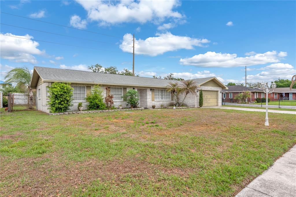 3420 Yale Circle Riverview, FL 33578 - Photo 2 of 30 a front view of a house with a garden